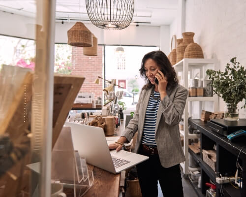 A business owner talking a call